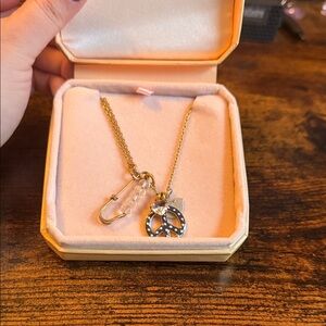 Juicy Couture Gold and Black Peace Necklace